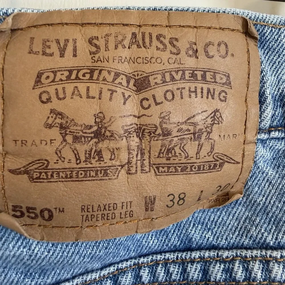 Vintage Levi’s 550 Jeans Men’s 38x30 Relaxed Fit Tapered Leg Light Wash orange
